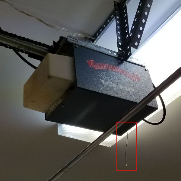 The antenna dangles outside the unit making it easy to cut